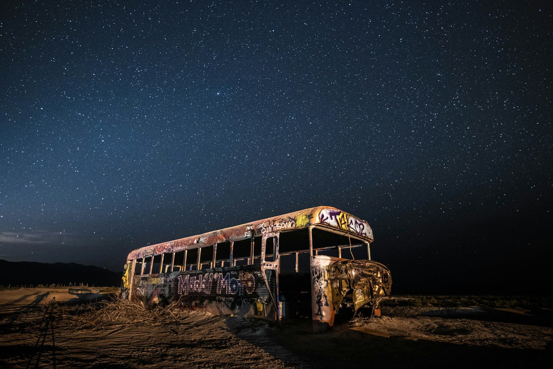 Broken down bus under the stars